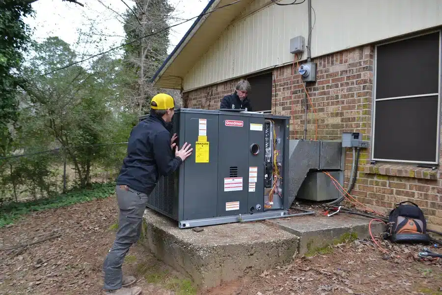 SBC technicians installing a Goodman HVAC unit in Shreveport, Louisiana, providing professional installation and residential heating services